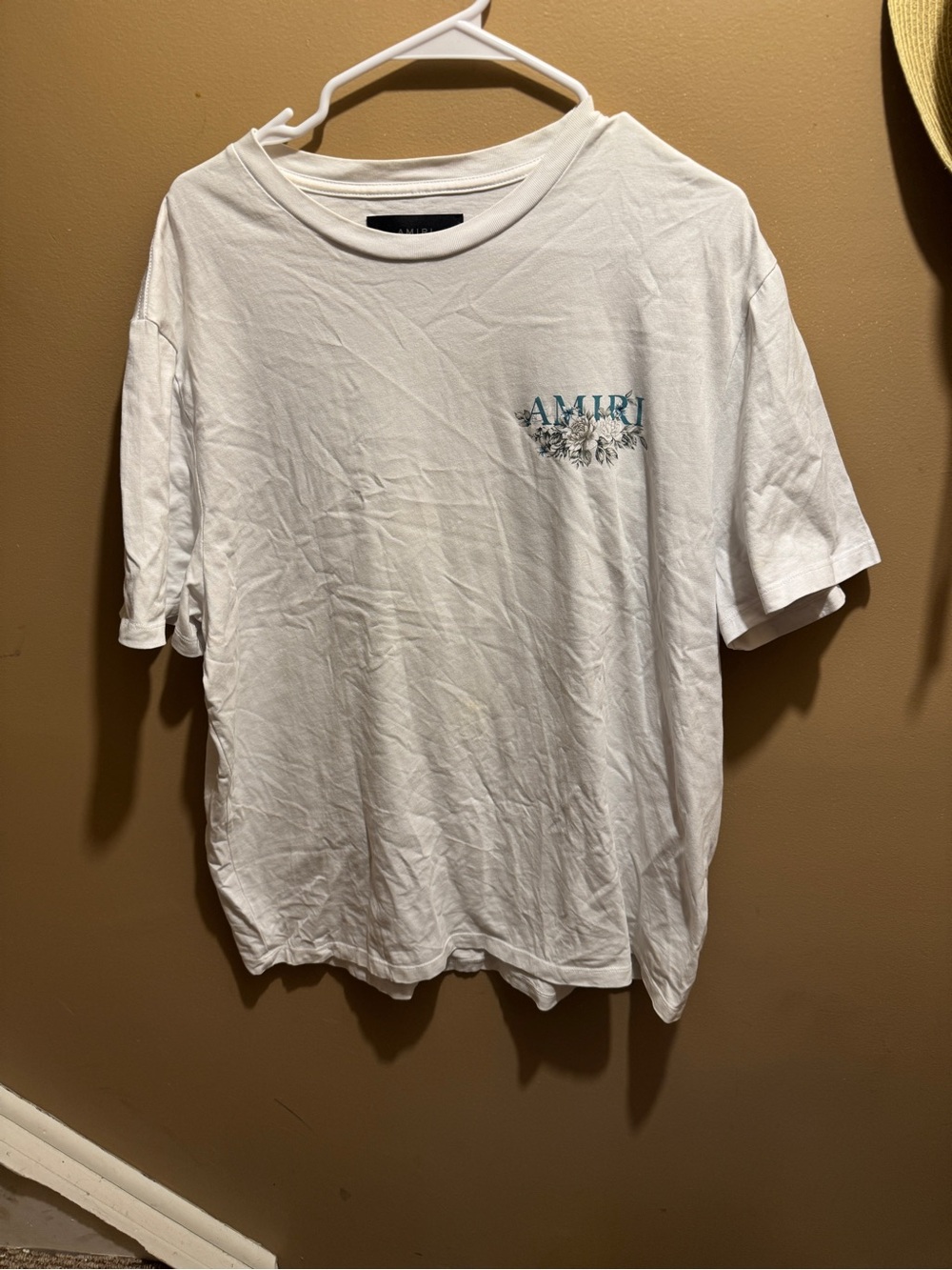 AMIRI White Tee with Teal Floral Chest Logo